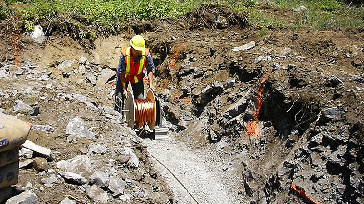 Man laying the Ground work | SAE Inc.